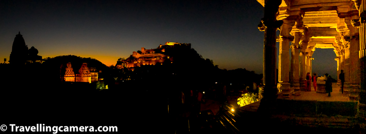 Why Neelkanth Mahadev Temple inside Kumbalgarh Fort is best place to see evening lighting?   Just after sunset (at around 6pm), lights are switched on for 15 mins at Kumbalgarh Fort and Neelkanth Mahadev temple is best place to have a panoramic view of whole fort and surrounding temples. Above photograph shows panorama of Vedi temple on left, then Badal Palace and main fort on the top and pillars of Mahadev temple on right. So if you go to the fort to see evening lighting, just go to the Neelkanth Mahadev temple and enjoy views of the fort. Since you only get 15 mins, enjoy views from here and if you feel if you have more time, go to Vedi temple and take stairs to go to the wall from where you get beautiful view of Neelkanth Mahadev temple with evening lights on it. Pillars of Neelkanth Mahadev temple stand out beautifully in evening light at Kumbalgarh Fort.