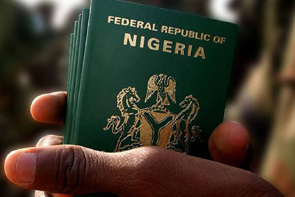 Immigration, Firm Blame Cash Crunch for Passport Booklet Scarcity