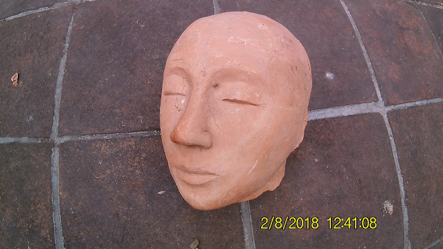 This head is part of an artwork below.