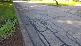 the crack sealing in front of the house