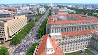 Protesters march away from the US Capitol on Saturday in Washington.(Credit: cnn.com) Click to Enlarge.