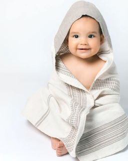 Baby wearing Aden Hooded Baby Towel
