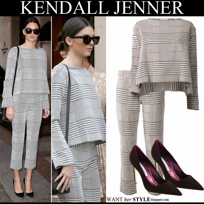 WHAT SHE WORE: Kendall Jenner in grey top black leggings and white