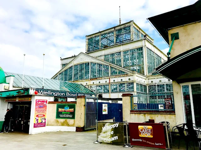 A view from Marine Parade to the Winter Garden in Great Yarmouth which is a bit like a large metal and glass greenhouse, photo taken in 2018