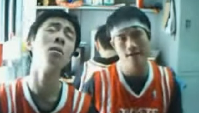 Two Chinese boys lip syncing to Backstreet Boys' classic hit, I Want It That Way.
