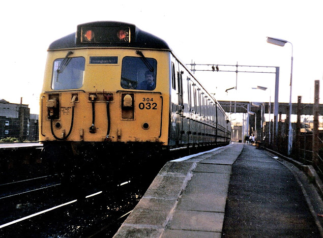 photo of british rail liveried class 304032 electric multiple unit train at bescot