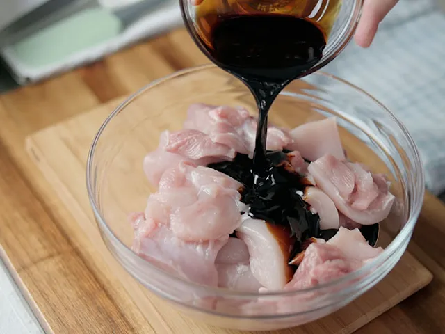 Marinate  chicken thigh with soy sauce