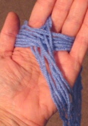 Holding the cross for the new warp in my hand.