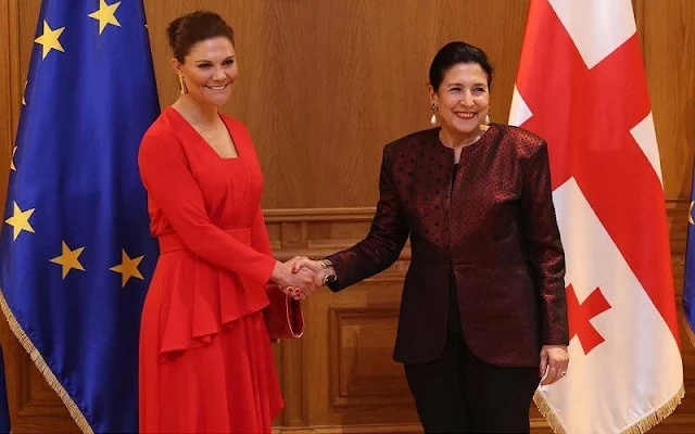 Dagmar Jazmin midi red dress. President Salome Zurabishvili