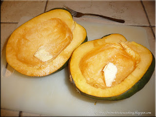 add a little butter and salt to the acorn squash cavity