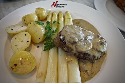 Huber's Bistro, white asparagus boiled potatoes tasmanian grass feed beef fillet mushroom sauce