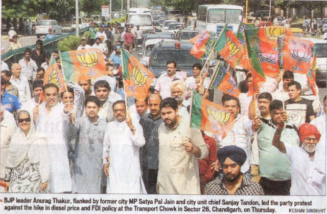 BJP leader Anurag Thakur, flanked by former city MP Satya Pal Jain and city unit chief Sanjay Tandon, led the party protest against the hike in diesel price and FDI policy at the Transport Chowk in Sector 26, Chandigarh, on Thursday.