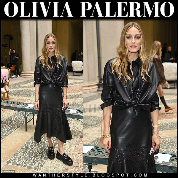 Olivia Palermo in black leather shirt and black leather midi dress at Milan Fashion Week
