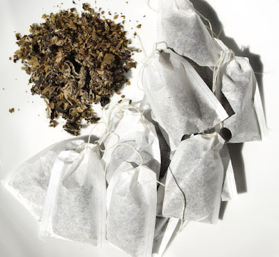 Black tea leaves and bags made with blackberry, raspberry and strawberry leaves