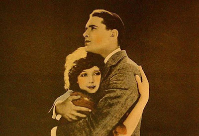 madge bellamy lloyd hughes embrace silent movie