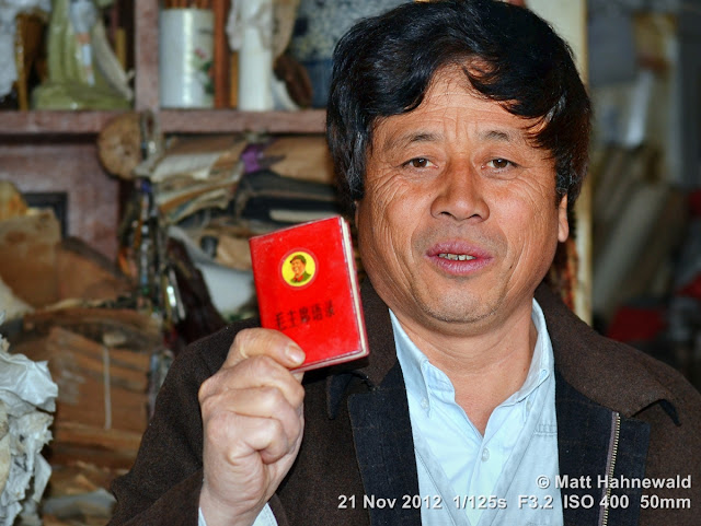 people; Chinese people; Chinese man; portrait; street portrait; headshot; South China; Yunnan province; Kunming; Mao's little red book; close up