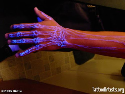 skeleton tattoos. This black-light skeleton