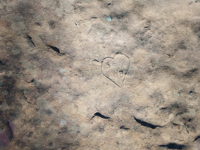 Heart engraved into rock face
