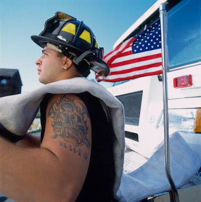 Firefighter Tattoos It's A firefighter with flame