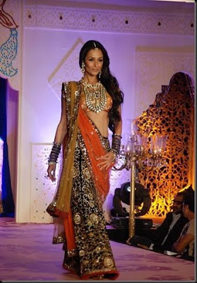 Malaika Arora walks the ramp for Shagun Vikram Phadnis