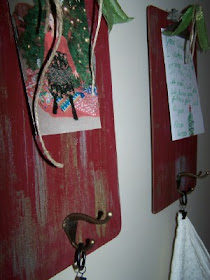 clipboard stocking holder http://bec4-beyondthepicketfence.blogspot.com/2010/12/12-days-of-christmas-ideas-day-9.html