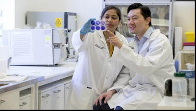 Researchers Anukriti Mathur (left) and Si Ming Man (right) examine bacteria that causes food poisoning (via Australian National University)