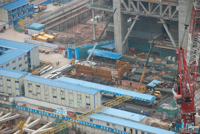 Photo of steel sections being prepared for lifting to the top floors