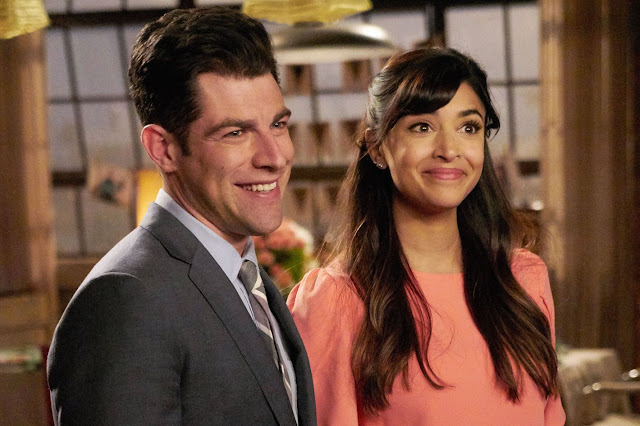 Schmidt and Cece from New Girl. Both are smiling.