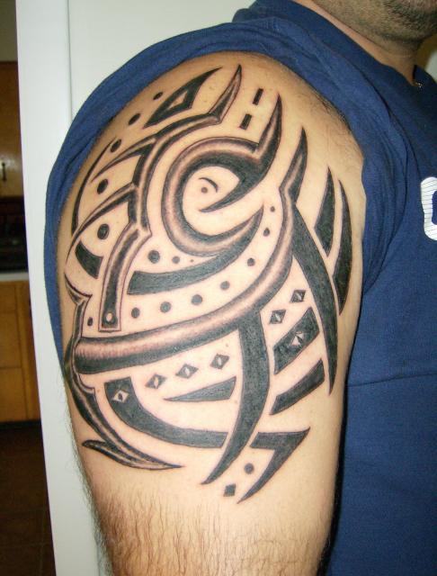 shoulder tattoo tribal. A tribal tattoo is quite an