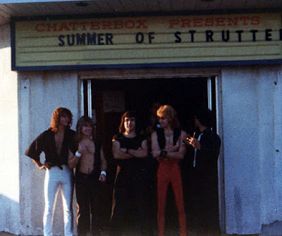 Strutter in front of the Chatterbox rock club