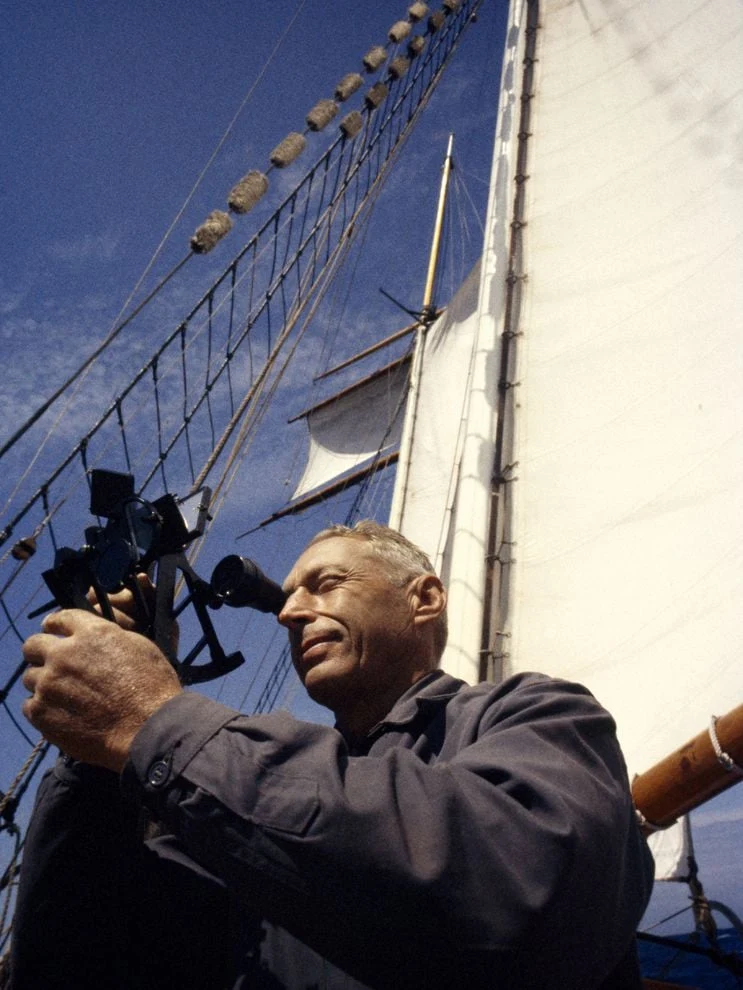 A sailor seaman seafarer using sextant