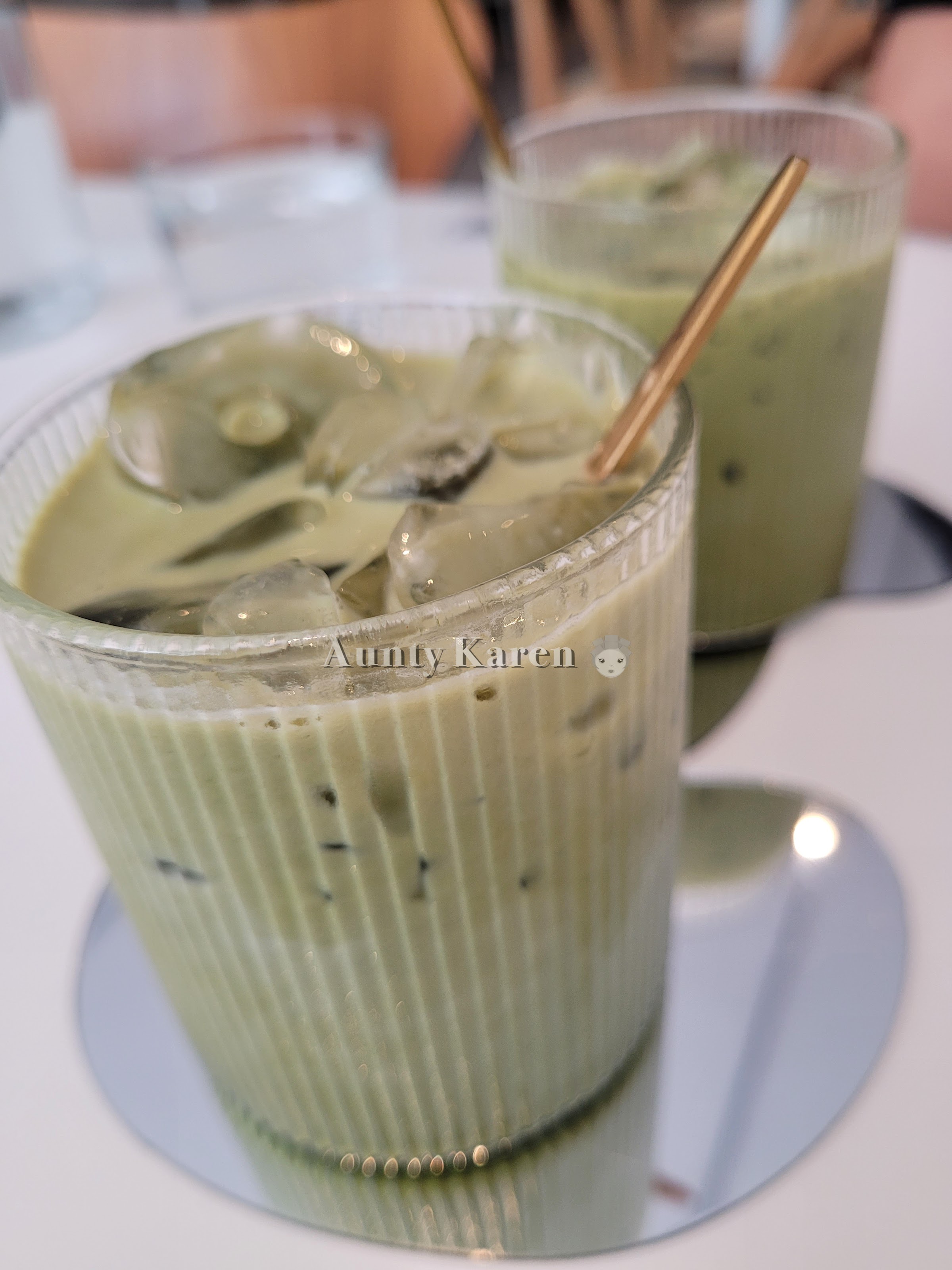 Close-up of two glasses of dirty matcha