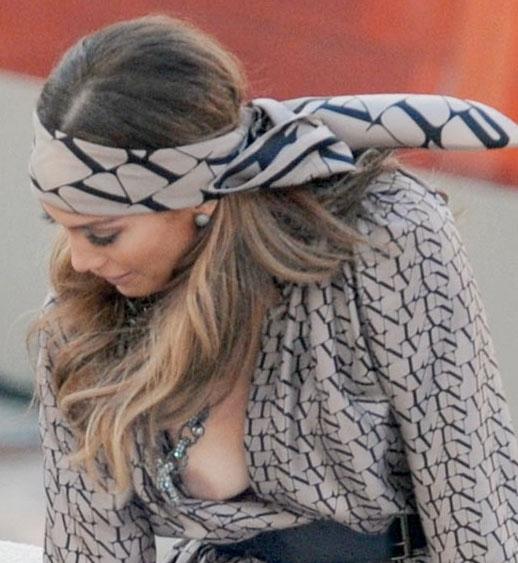 JLO'S NIP SLIP Her camp claims that is dress tape