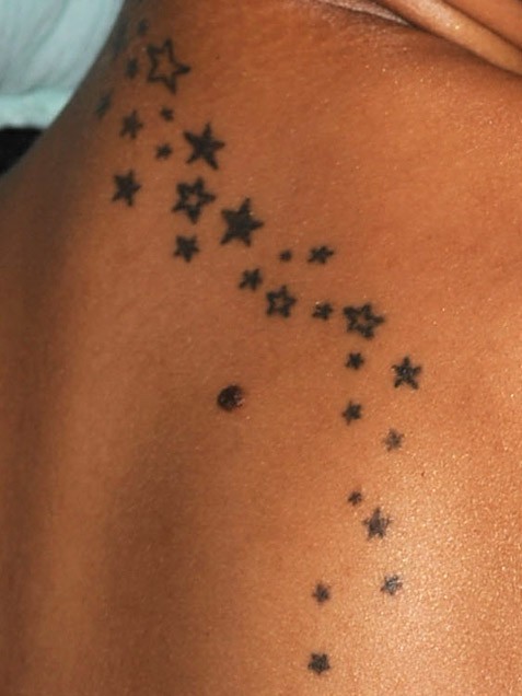 Rihannas tattoo is WOW I have a thing with stars I really want to get