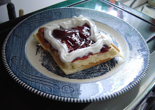 homemade belgian waffle with strawberry topping.jpeg