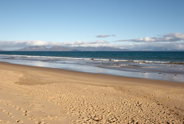 View from Nine Mile Beach with the mountains of Freycinet on the horizon