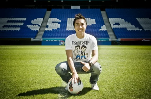 Indonesian teen Arthur Irawan poses at the Estadi Cornellà-El Prat after signing for Espanyol