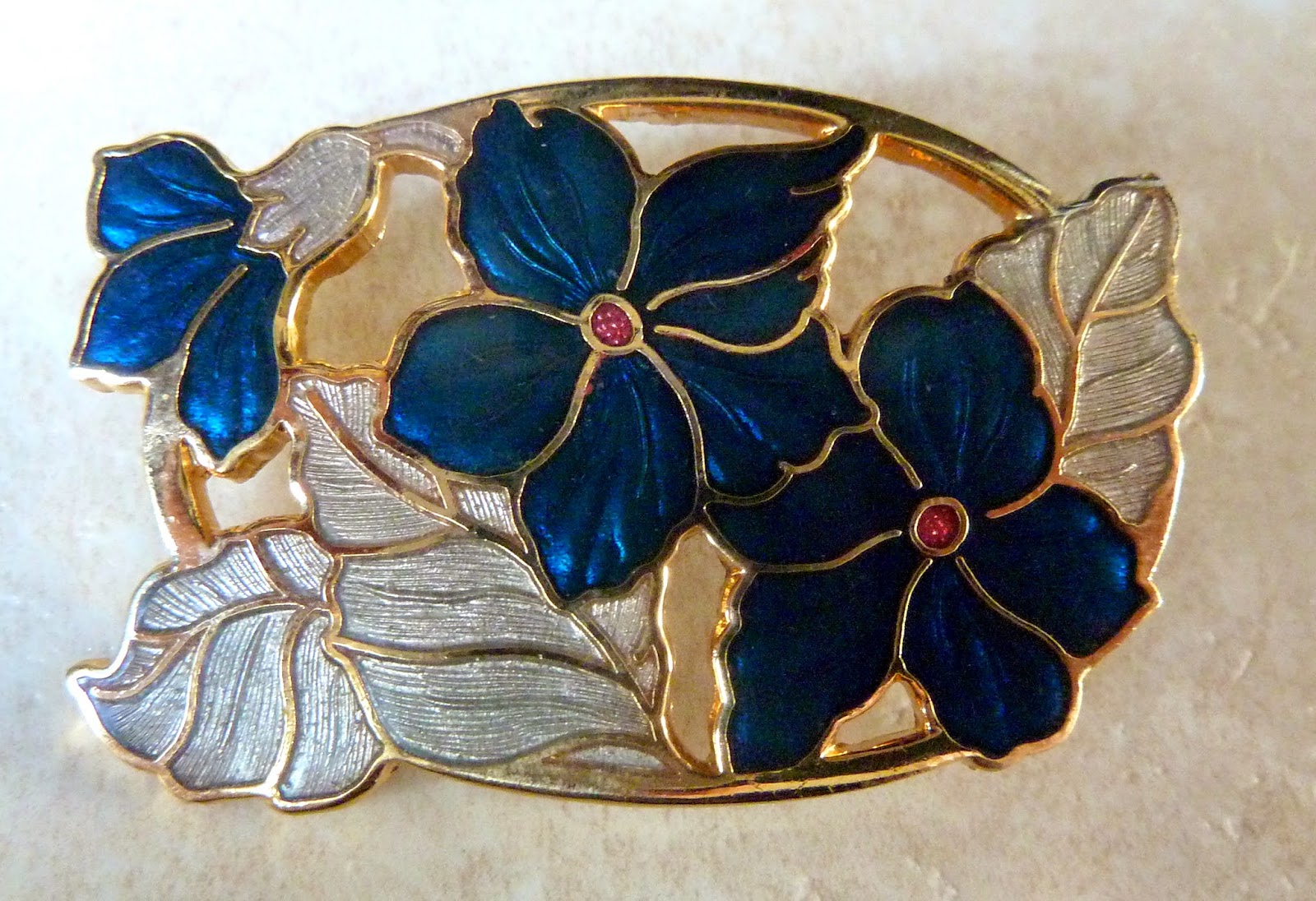 http://www.kcavintagegems.uk/fish-and-crown-cloisonne-enamel-blue-floral-brooch-415-p.asp