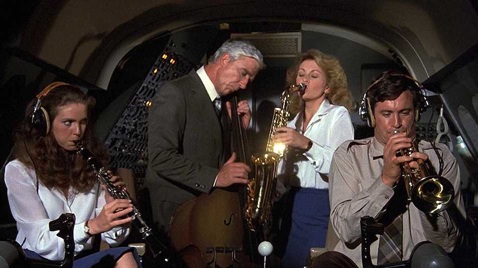 Photo from Airplane showing characters playing jazz instruments in cockpit
