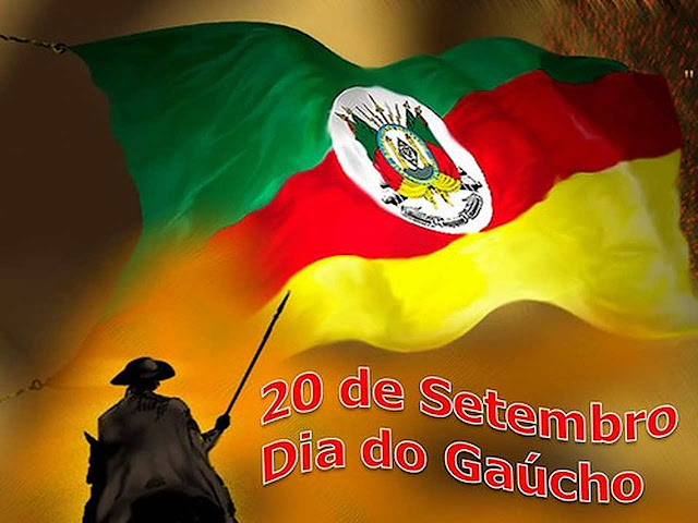 Cavaleiro gaúcho com a bandeira do Estado do Rio Grande do Sul.