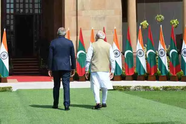 Prime Minister Narendra Modi (R) and Maldives President Mohamed Muizzu shake hands before their meeting at Hyderabad House on October 7, 2024, in New Delhi, India. Photo by Sonu Mehta/Getty Images