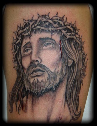 tribal jesus tattoo. tribal wrist band 