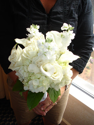 Bridal bouquet White roses white hydrangeas white minicallas 