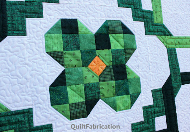 green four leaf clover quilt center