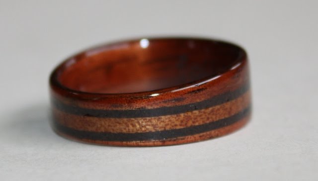 For Kevin's wedding ring they designed this dark Hawaiian Koa wood ring 