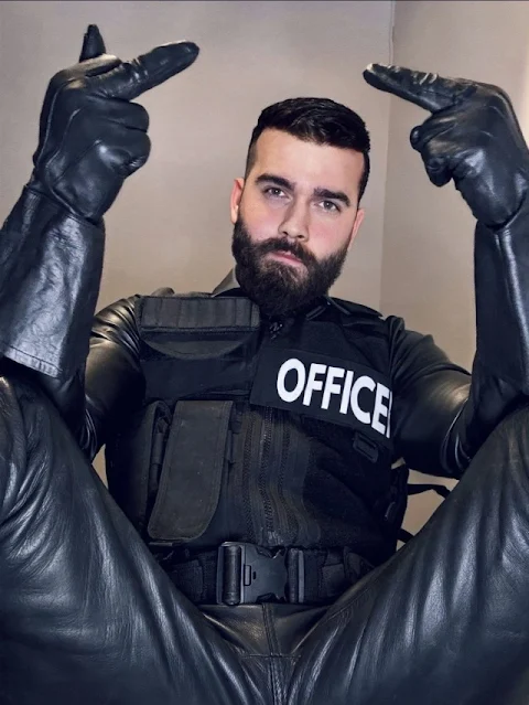 2/2 dark bearded leather daddy pants jacket and gloves getting the middle finger
