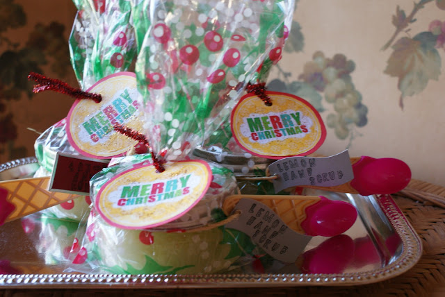 silver tray jars of DIY lemon sugar scrub plastic spoons