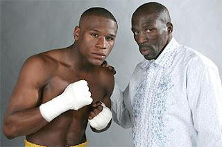 Floyd Mayweather with trainer and uncle Roger Mayweather