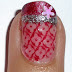 DIY Flower Nail Decoration Using Red and Pink Colours.