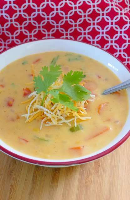 This easy, meatless soup is ready in 30 minutes! The Mexican flavors make this cheesy chowder absolutely delicious! The combo of carrots, celery, onion, bell pepper and corn make this soup so hearty! Add shredded rotisserie chicken if you're a meat lover!